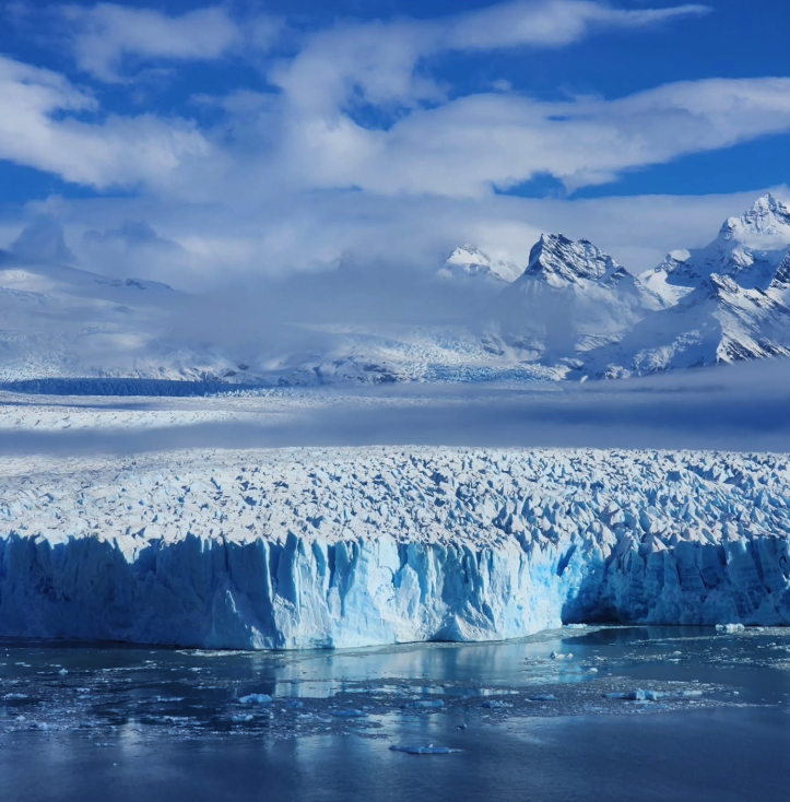 Visitors on a Perito Moreno Glacier tour facing the ice wall
